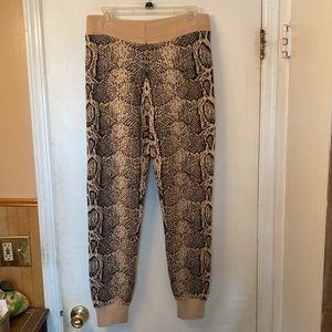 Fashion Nova black & tan snake print sweater pants